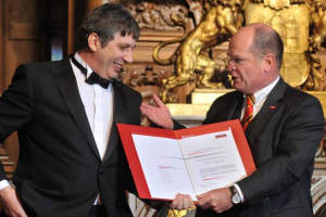Prof Geim receiving his award in Hamburg
