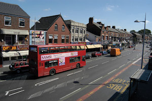 Red bus in Rusholme