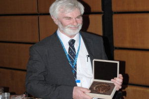 Professor Rutter with his medal