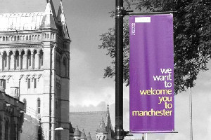 'We want to welcome you to Manchester' banner