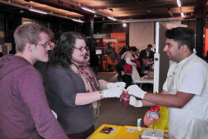 PhD student Sunil Logantha and MOSI visitors