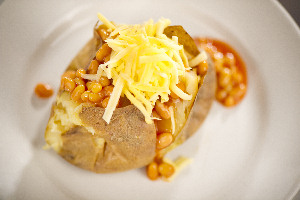 baked potato with beans and cheese