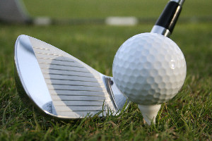 golf ball and club