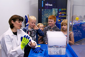 Children with scientist
