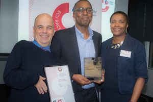 Patrick Johnson (centre) receives Race Equality Charter award