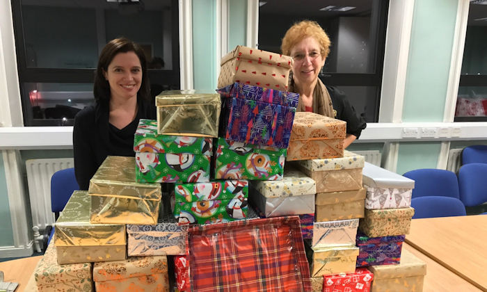 Helen Chilton and Wendy McCracken with filled shoeboxes