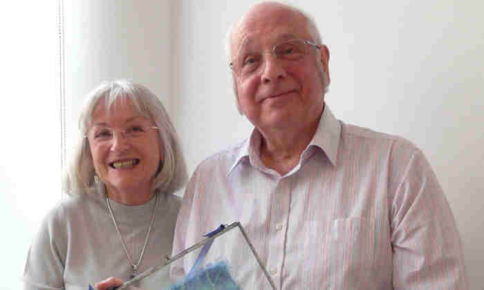 Elizabeth and David Moore with their award