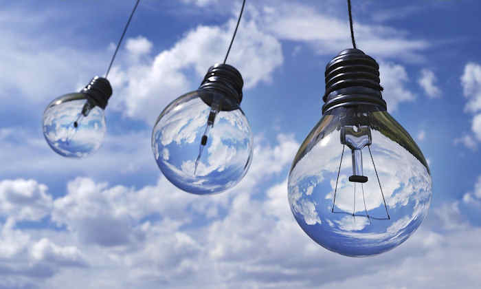 Lightbulbs in blue sky