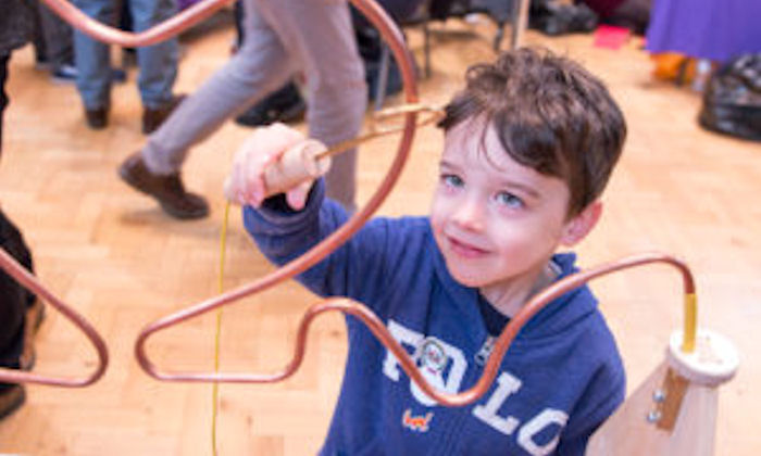 Child taking part in social responsibility activity