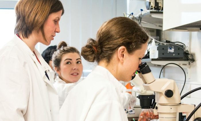 Photo of women in a science lab