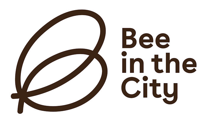 Bee in the city logo