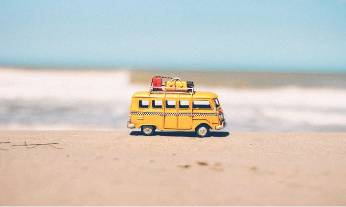 Toy van on beach