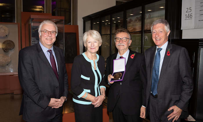 Emeritus Professor Tony Redmond receives medal from Nancy Rothwell