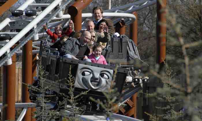 Families with young children on Thomas Tank rollercoaster