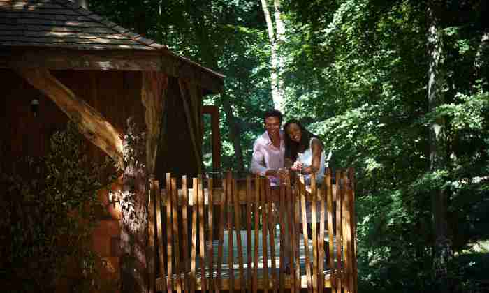Forest Holiday - couple in forest holiday home