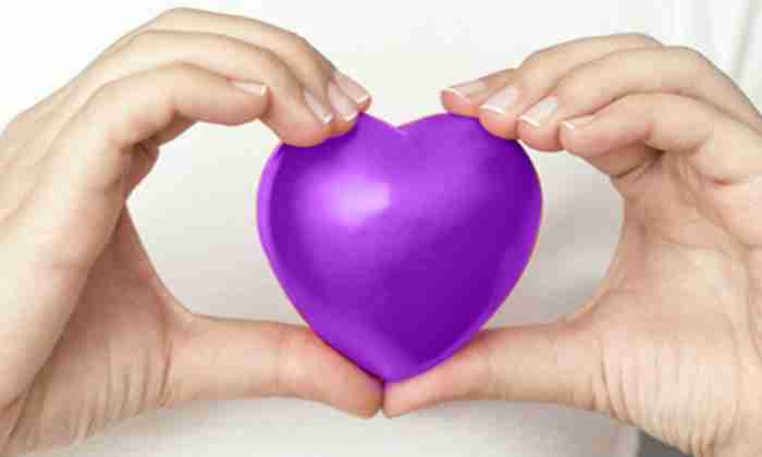 Holding purple heart