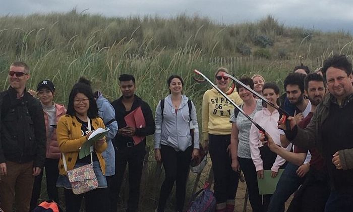 Colleagues clean up Crosby Beach