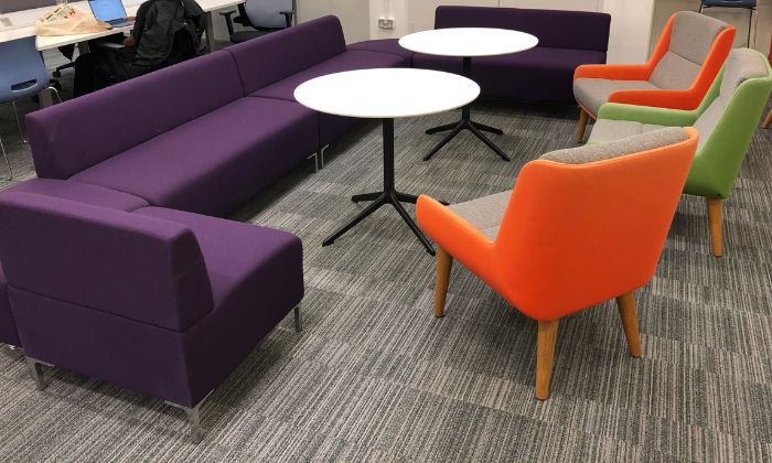 Seating and tables in the Library Living Room