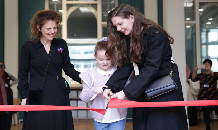 Cutting the red ribbon at Museum reopening