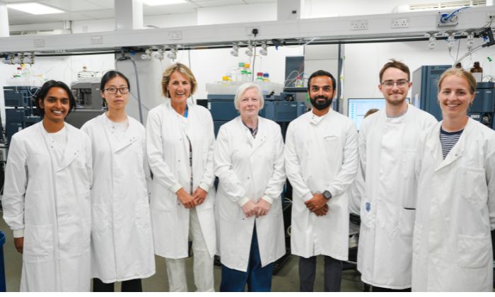 Joy Milne (centre) and the team