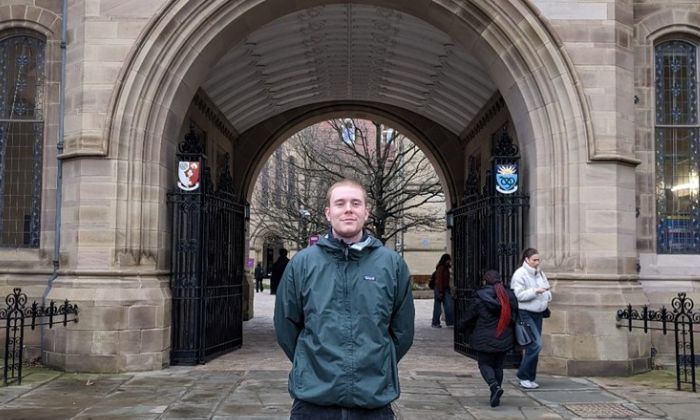 Will in front of UoM Arch