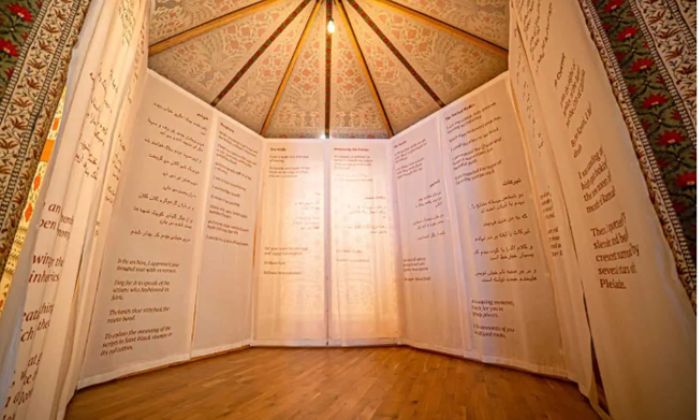 Exhibition showing writing on cloth