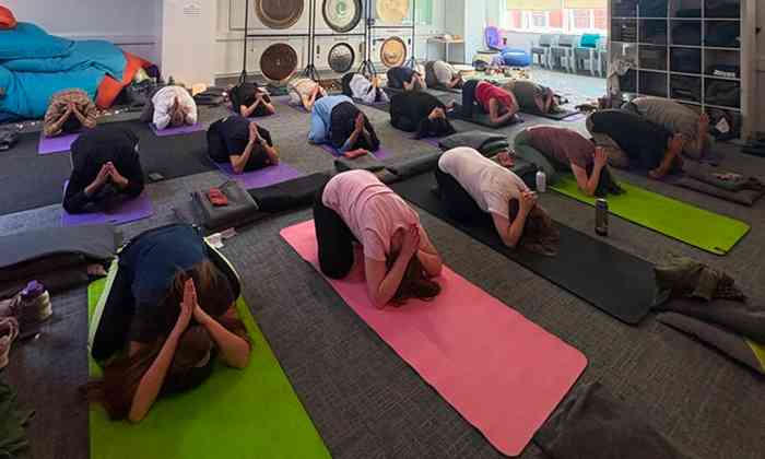 People practicing yoga and meditation 