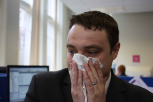 Use a tissue to catch your sneezes